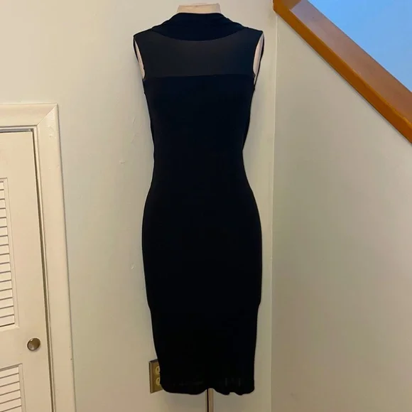 sachin and babi light blue dress DSquared Milan Ready to Wear Autumn Winter Red leather bandeau dress black  belt, black gloves and black platform ankle boots Stock Photo